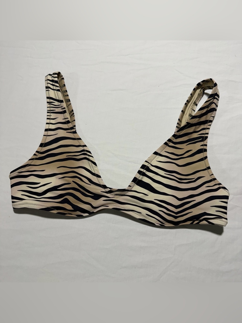 SKIMS Signature Swim Plunge Triangle Top in the Champagne Tiger Print colorway